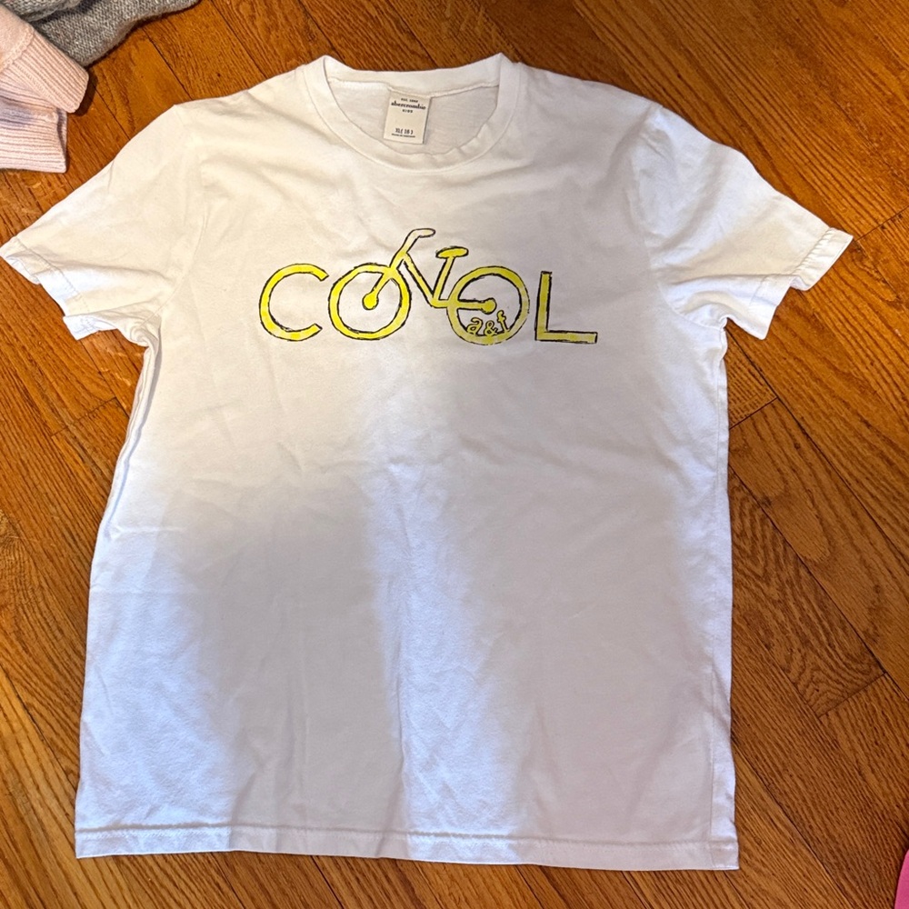 White T-Shirt with Yellow Bicycle Graphic